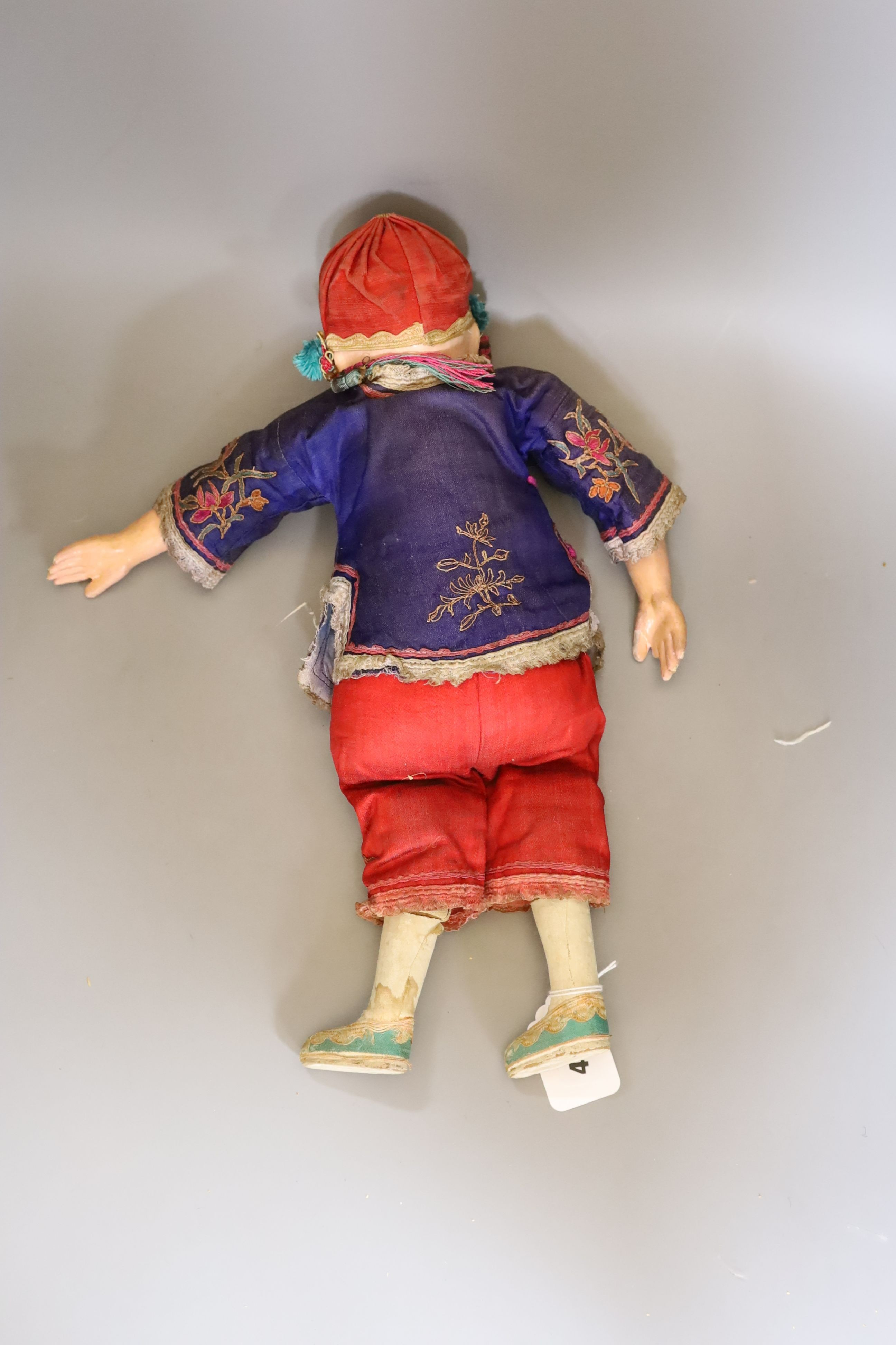 A papier mache doll, a Chinese boy in Chinese costume - 40cm high